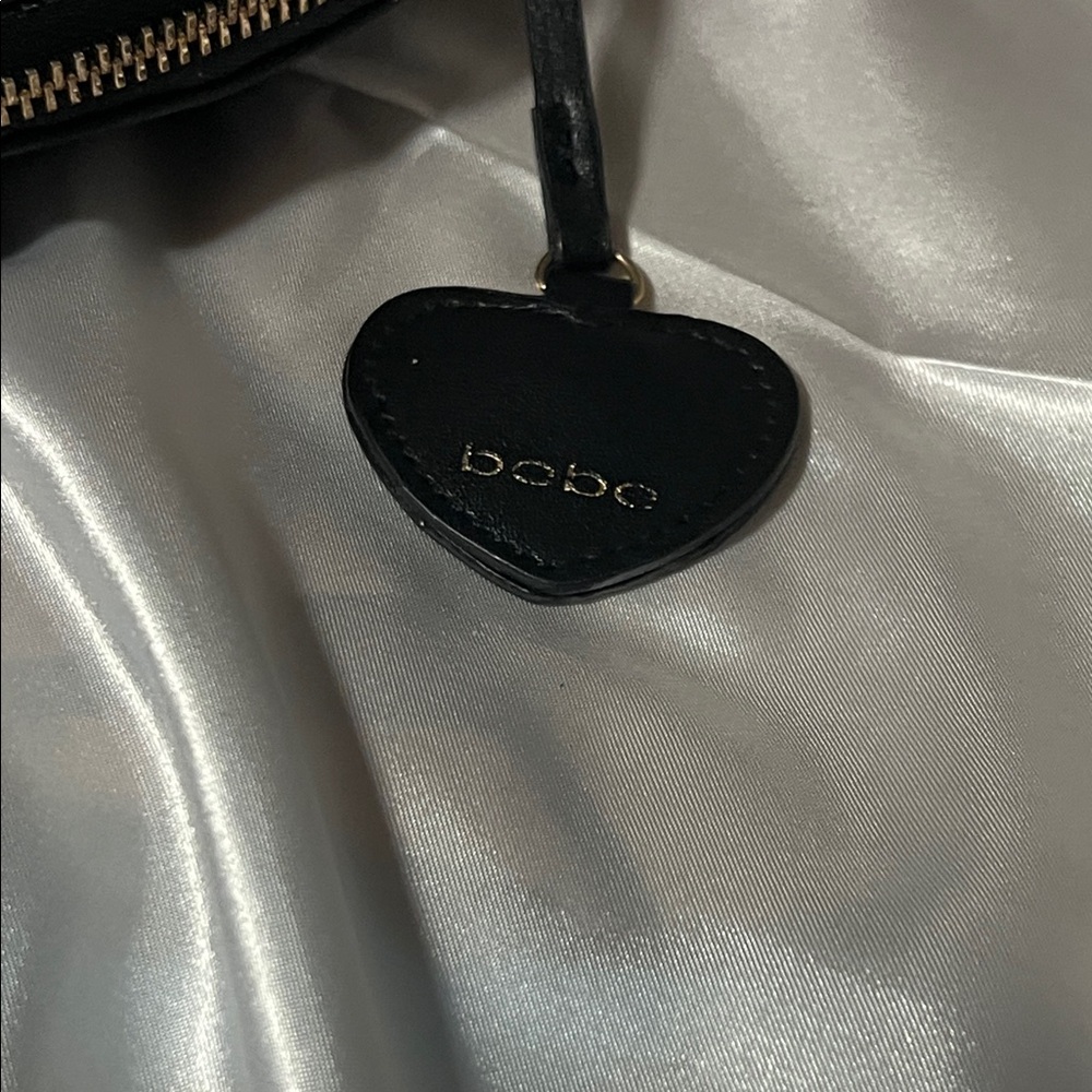 Bebe Black Heart Crossbody Bag with Gold Accents